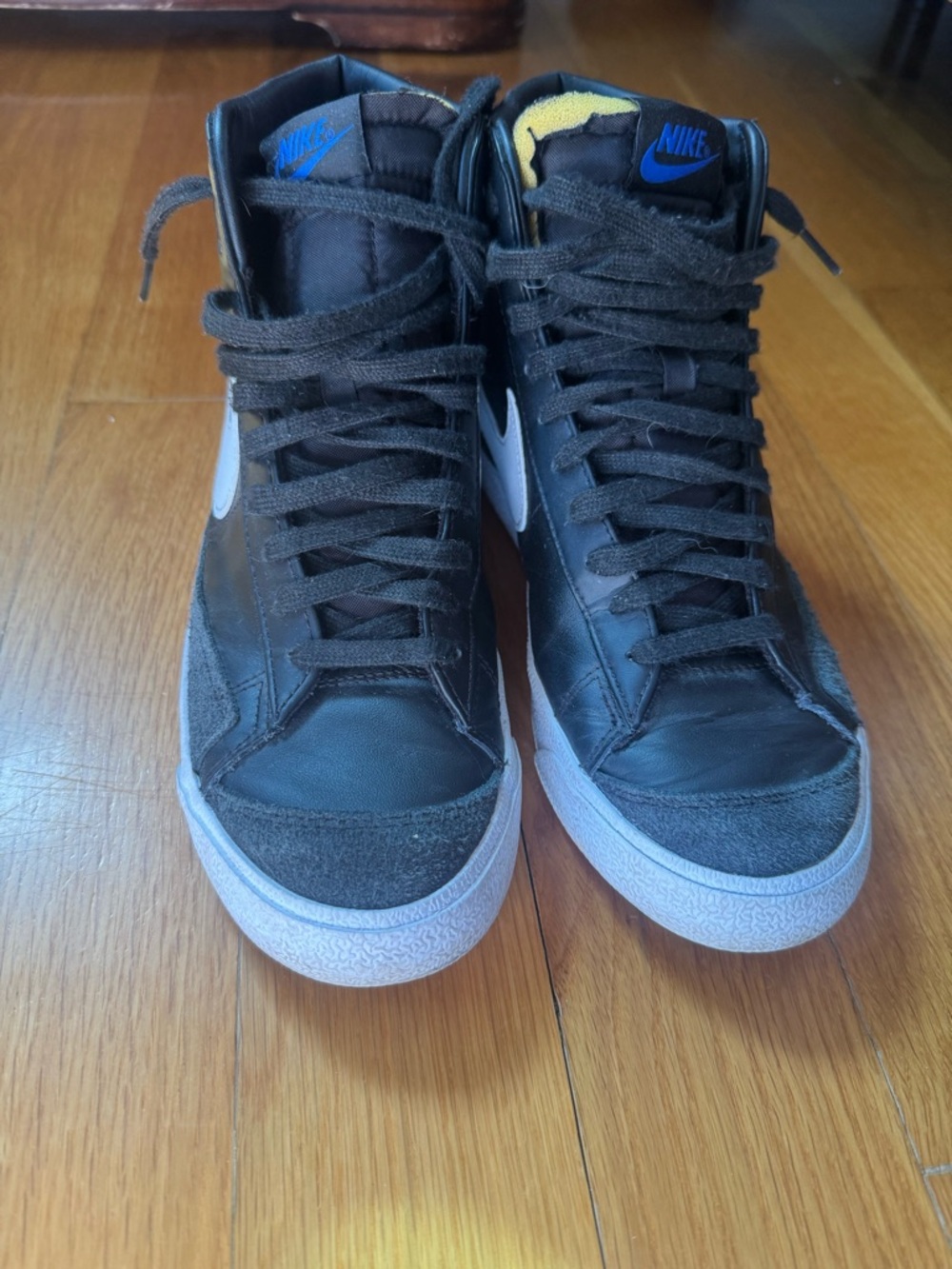 Nike women’s  Black High-Top Sneakers with White Swoosh